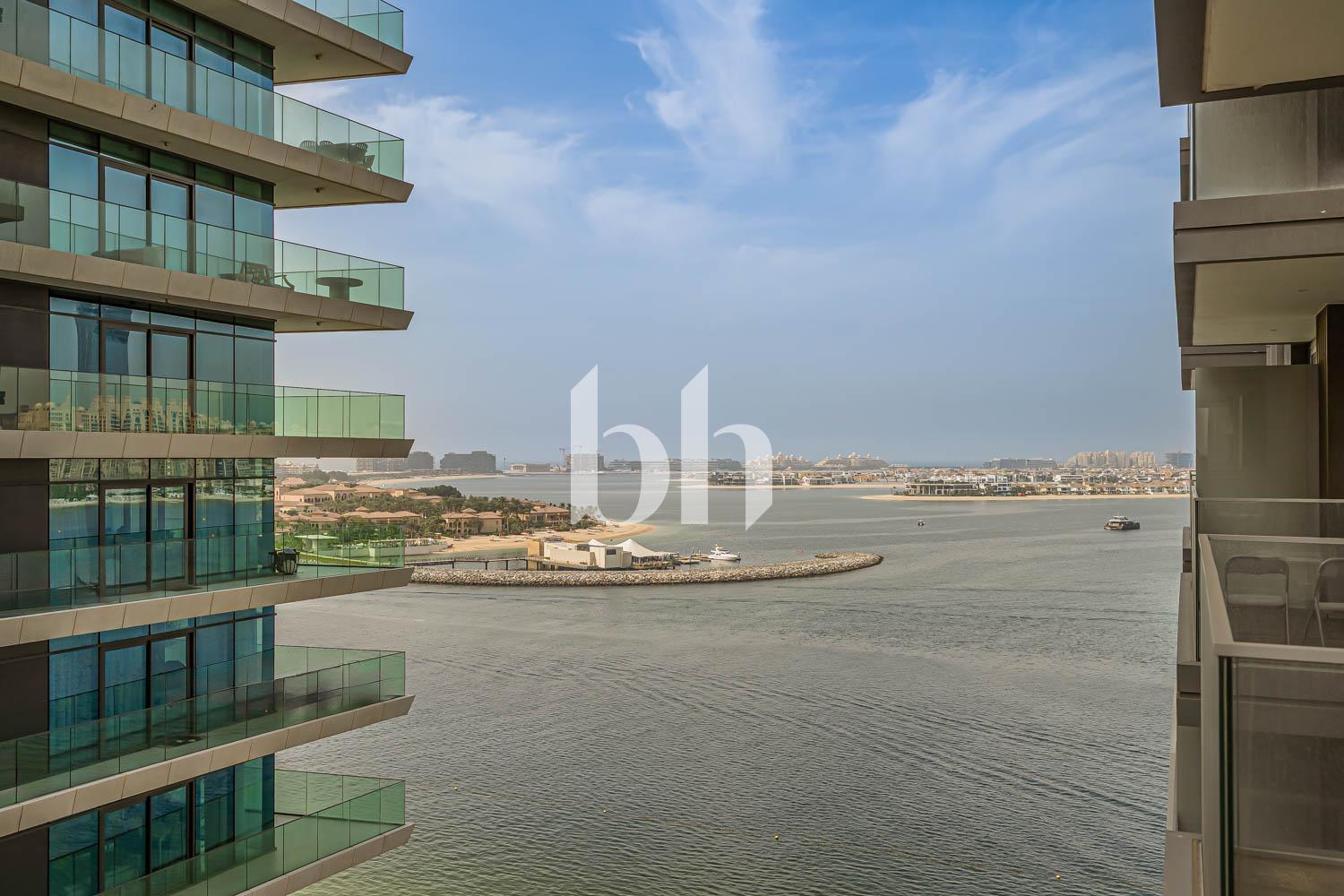 Furnished 1BR | Palm & Sea Views | Private Beach