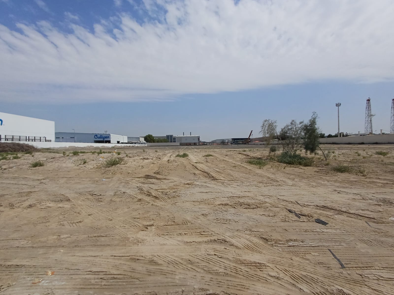 INDUSTRIAL PLOT | SHEIKH ZAYED RD. | REVISED PRICE