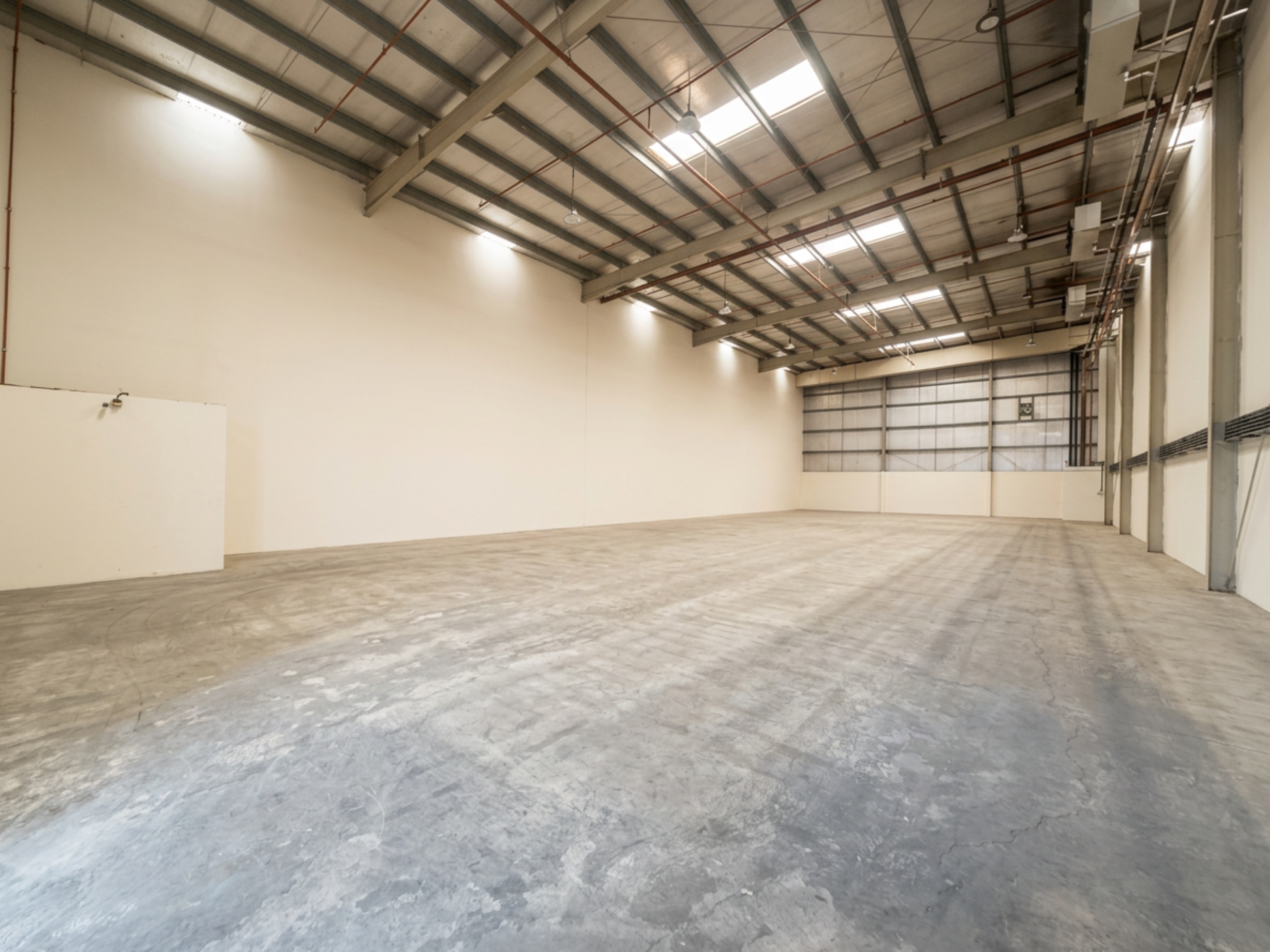 Warehouse for rent in Phase 2 at 353,475 AED per year